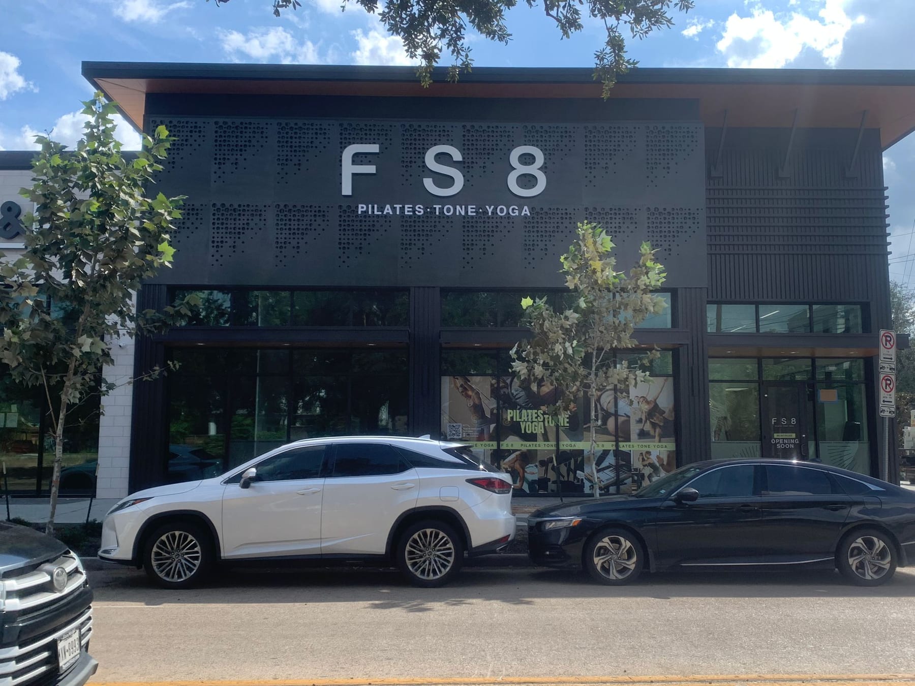 FS8 Pilates Tone Yoga storefront with dimensional letter sign fabricated and installed by Four Points Signs & Graphics in the Greater Houston area